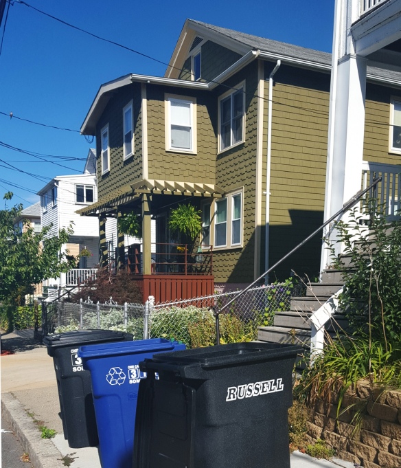 garbage bins outside on the street in Somerville