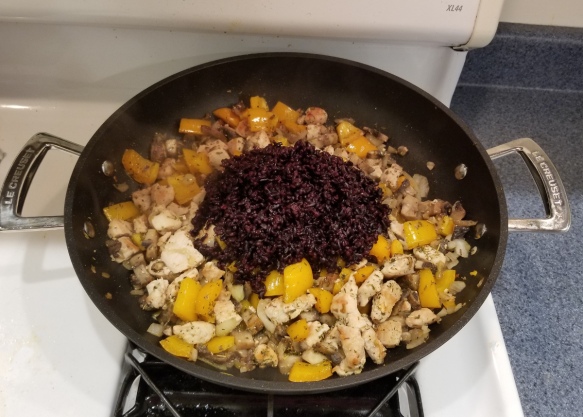 Acorn squash filling made of chicken, forbidden (black) rice and vegetables